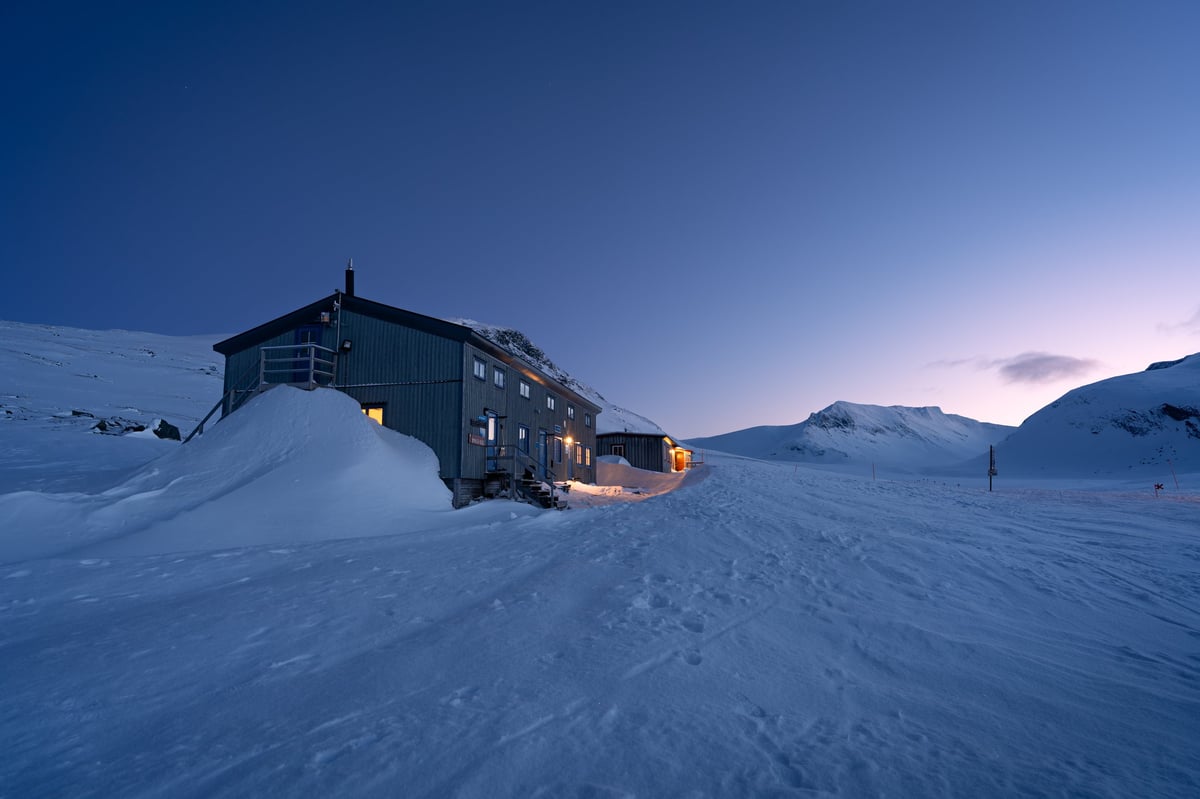 Sylarna Mountain station in Jämtland, Sweden, during a cold dusk in March.